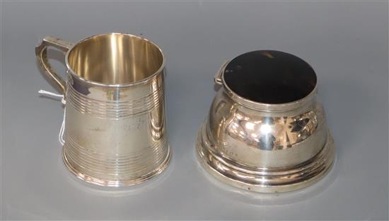 An Edwardian silver christening mug, Goldsmiths & Silversmiths Co Ltd, London, 1903 and a silver mounted inkwell.
